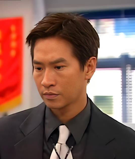 周家荣（《勇探实录》中由张家辉饰演的警察角色）